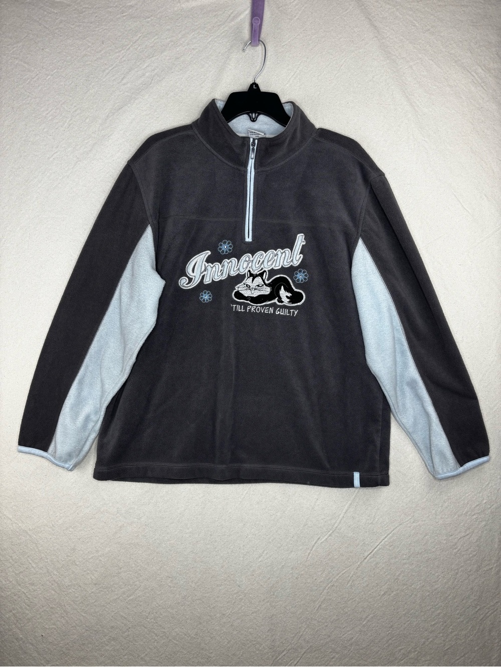 Looney tunes innocent until proven guilty fleece sweater